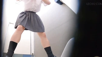 EE-793 05 Sudden urination urge on the way to school: schoolgirls rushing to the toilet with pre-pee drips.